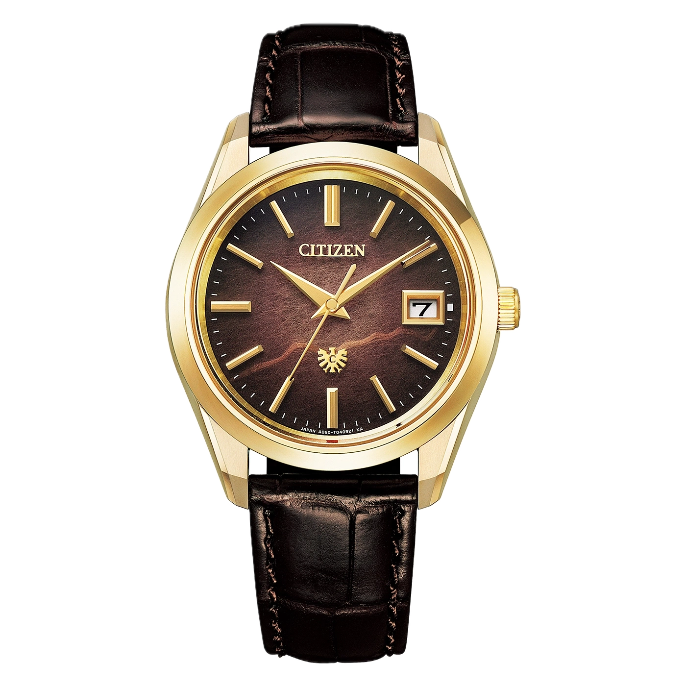 Une montre Citizen dorée à bracelet en cuir brun