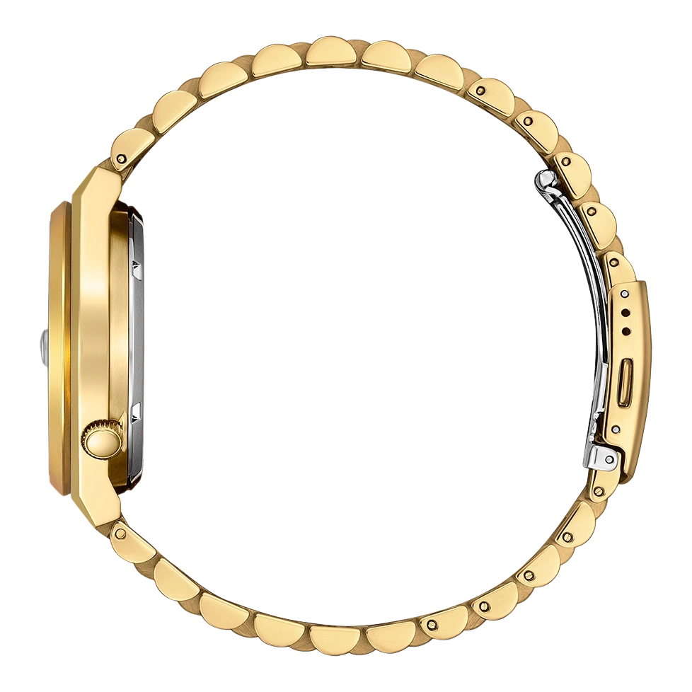 Gros plan sur le côté d'une montre dorée avec un bracelet assorti.
