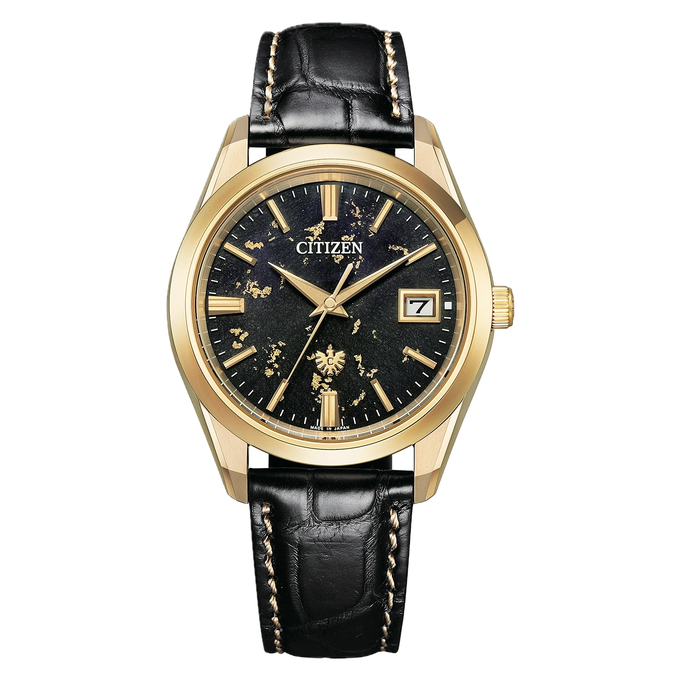 Montre Citizen dorée avec bracelet en cuir noir et cadran texturé.